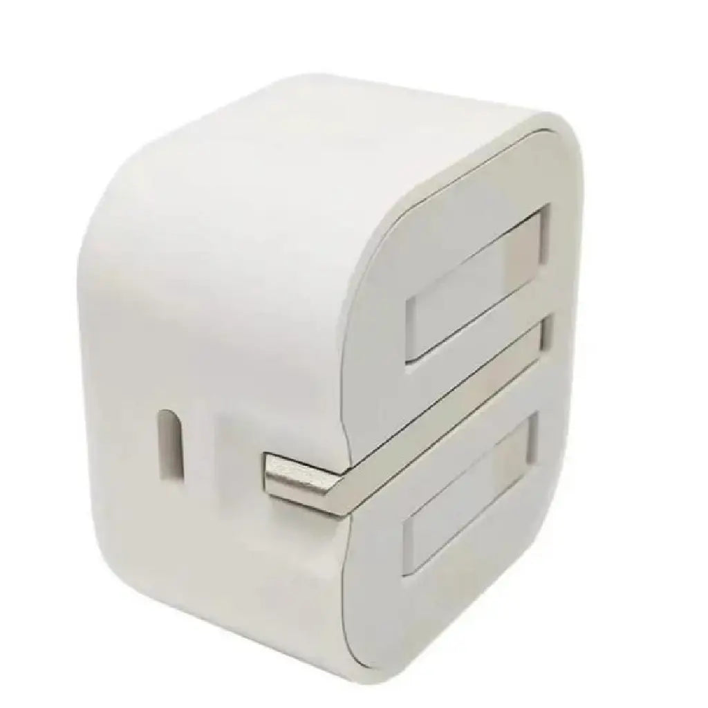 A white power adapter with a foldable two-prong plug on the left side and two USB-A ports visible on the right side.