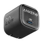 A compact, black Anker wall charger with a single USB-C port, featuring "20W" text on one side and the PowerIQ (IQ) logo below the brand name. It has two non-folding prongs visible on the bottom edge.