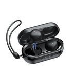 Black wireless earbuds in an open charging case on a white background