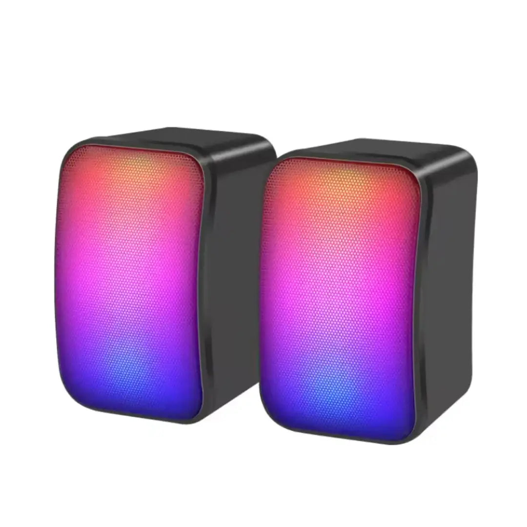 Pair of black speakers with colorful LED lighting on a white background