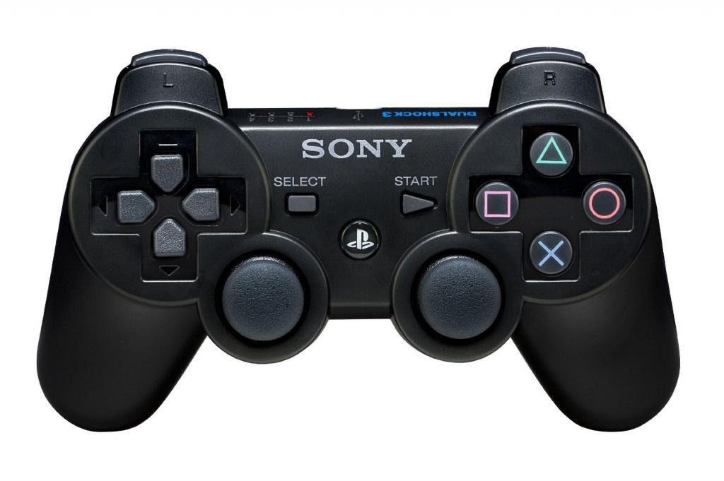Black Sony gaming controller on a white background