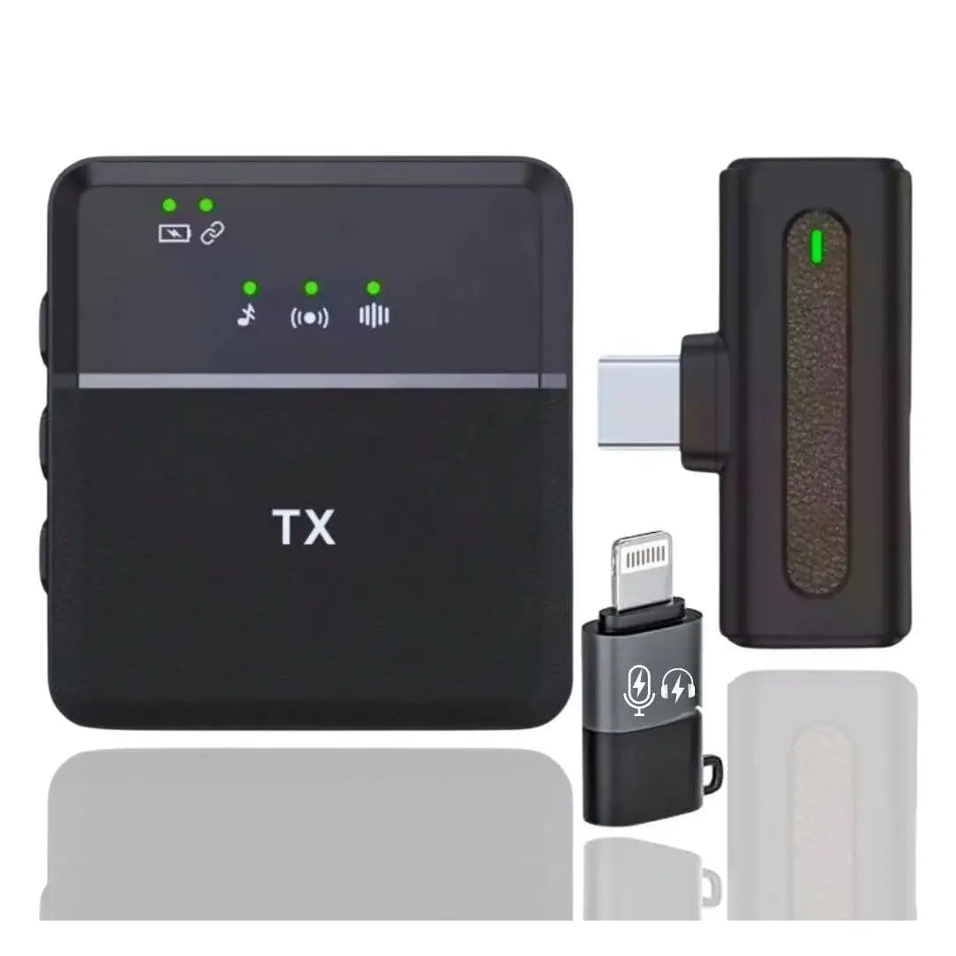 Set of electronic devices including a transmitter labeled 'TX' and various connectors on a white background.