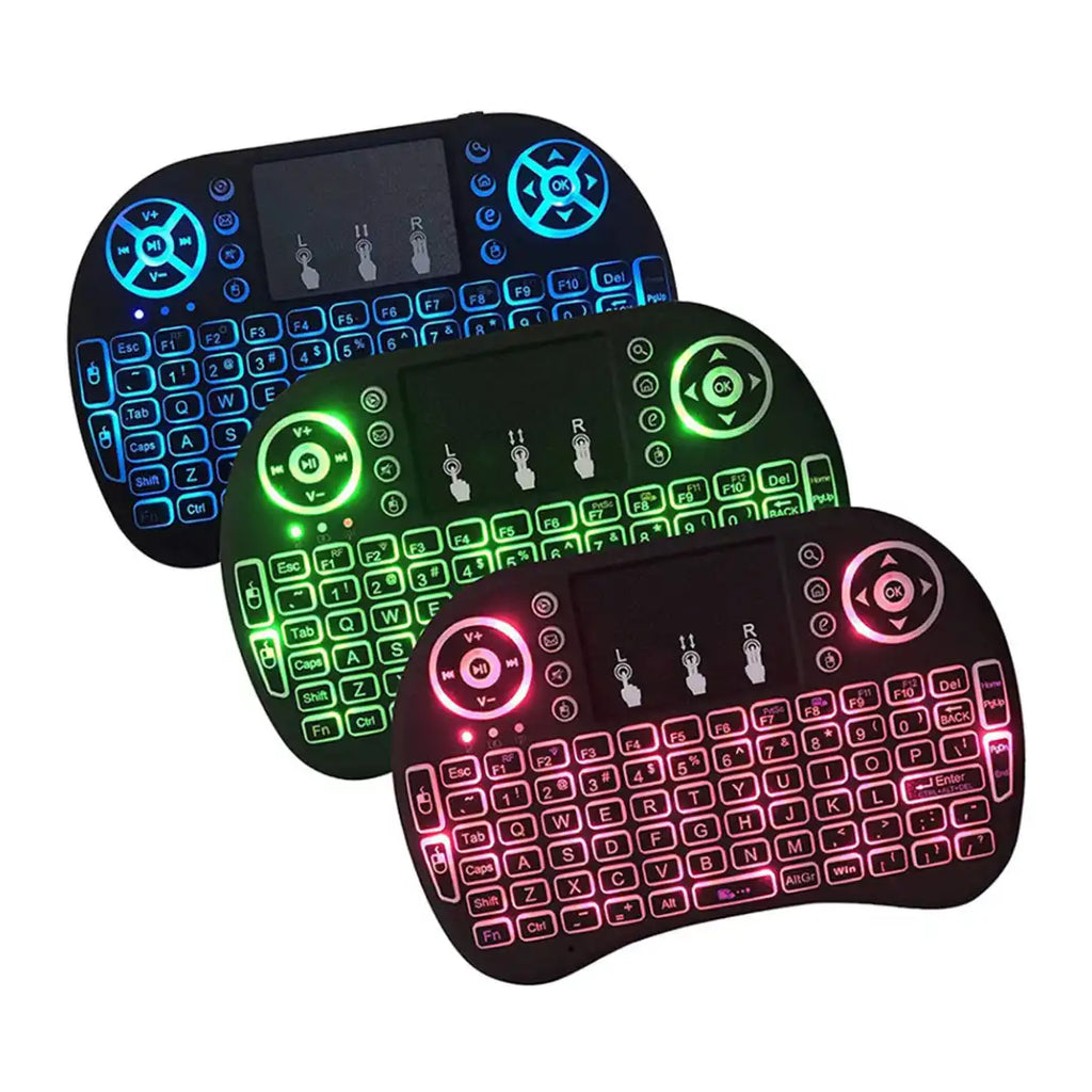 Three wireless keyboards with colorful backlighting on a white background