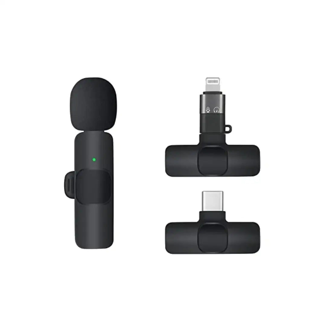 Black microphone adapter with multiple connector heads on a white background